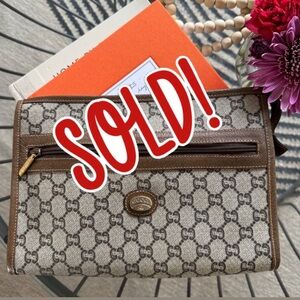 GUCCI GG Plus Supreme Clutch Leather Trim. Excellent condition. Made in Italy.